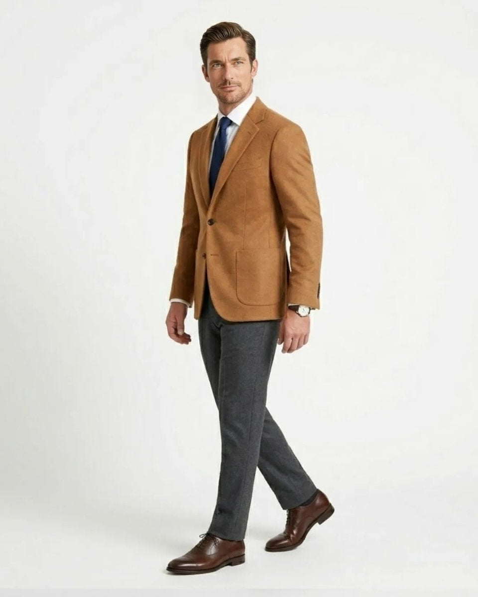Side profile of male model walking in the smart casual Fenlo Form camel blazer