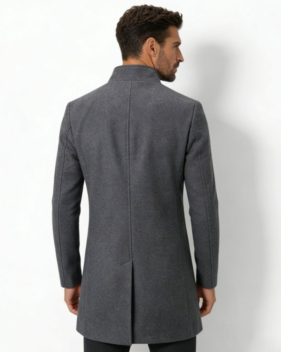 Back view of the men's charcoal grey winter coat, showing the structured shoulders and single vent detail.