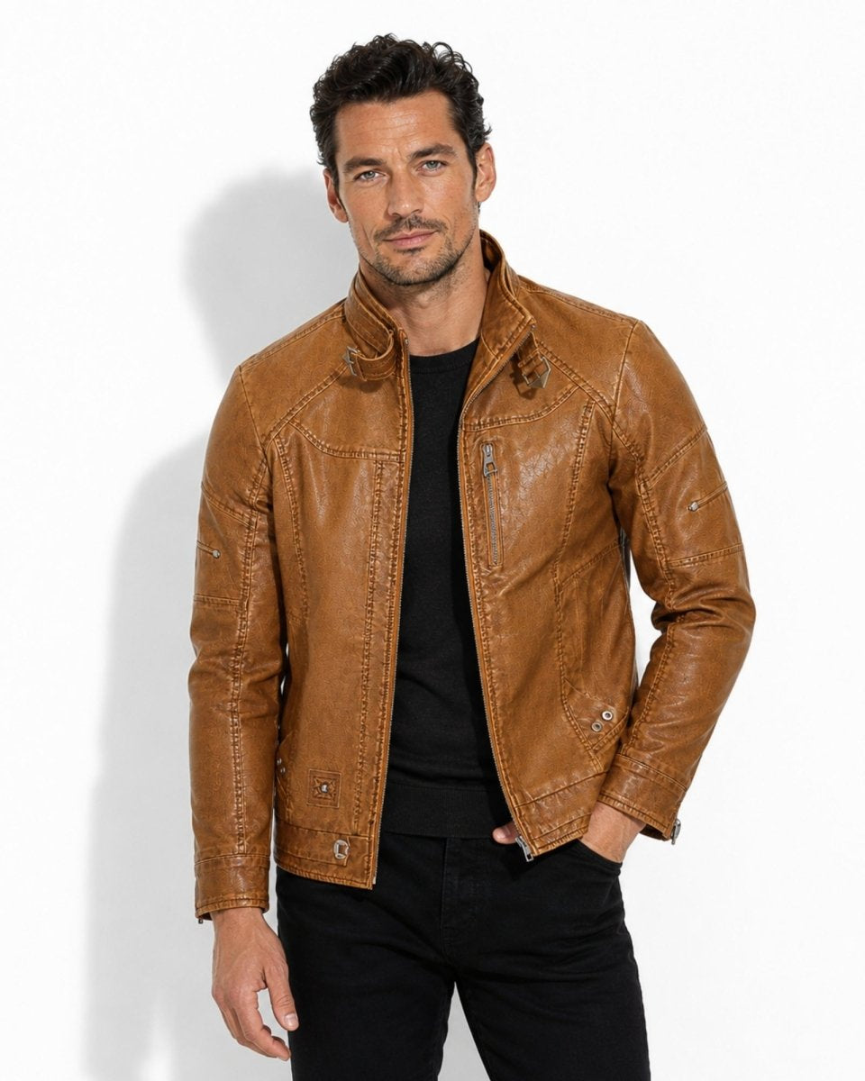 Male model styling the mens cognac tan light brown leather moto jacket with black denim.