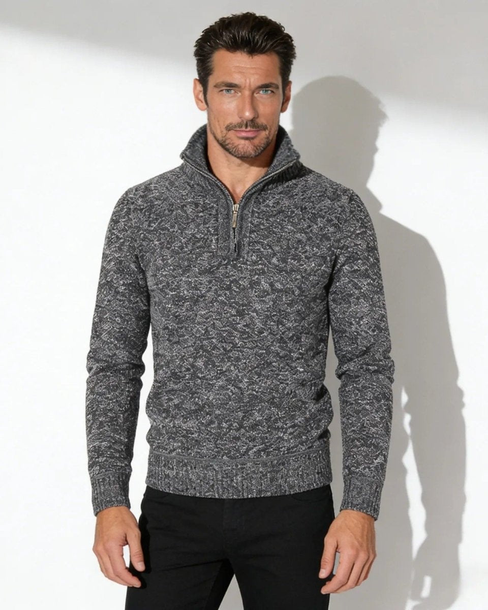 Male model wearing the grey elyson knit quarter-zip sweater, showing the textured fabric and fit from the front.