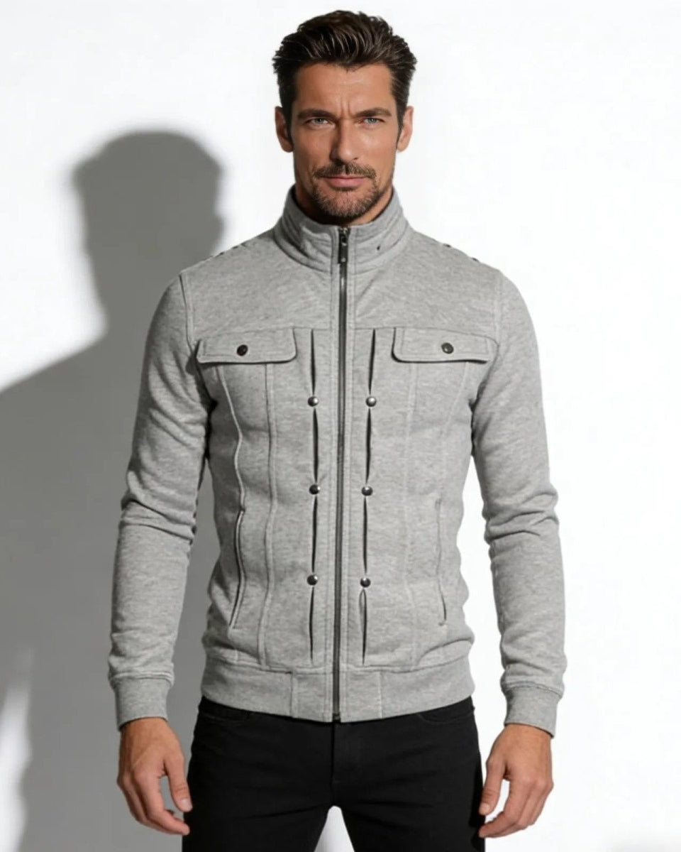 Model wearing the men's slim fit military zip-up jacket in heather grey with funnel neck and chest pockets.