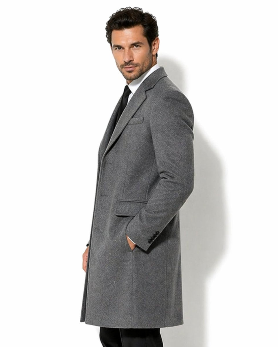 Side profile of men's slim fit grey winter dress coat showcasing the structured shoulder, tonal jacquard pattern, and flap pocket detailing.