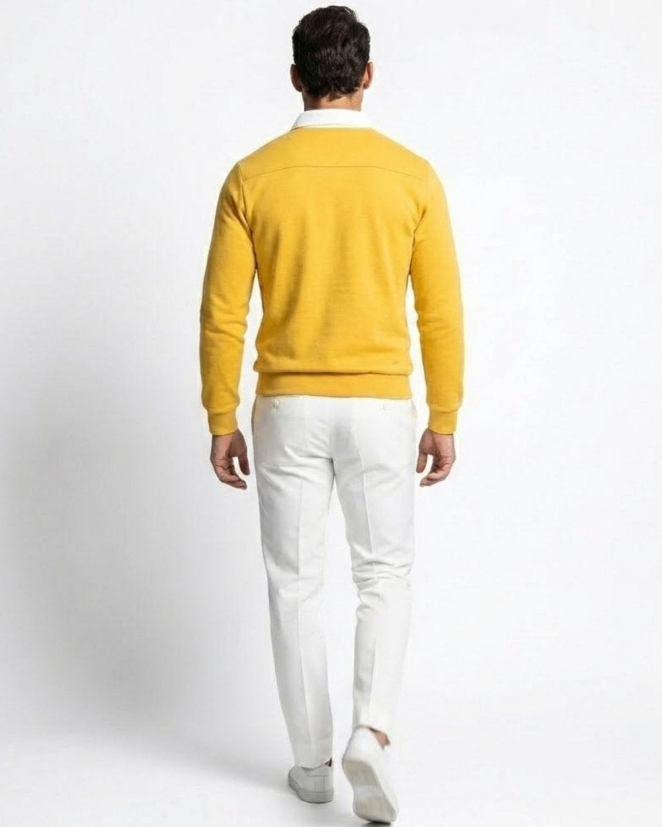 Back view of the men's yellow polo sweater, highlighting the back yoke seam detail and fit across the shoulders.