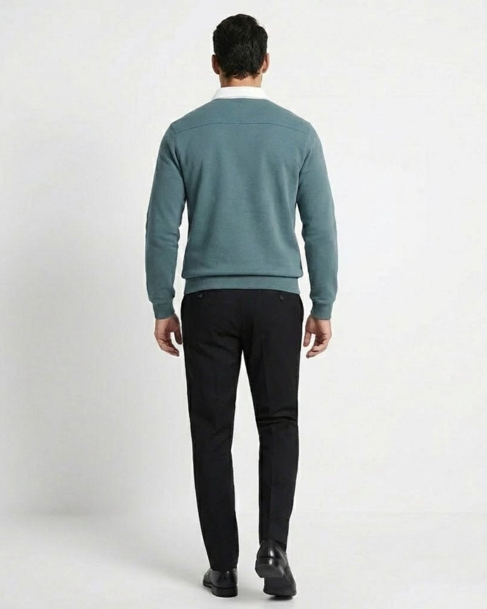 Back view of grey blue polo sweatshirt worn by a model, highlighting the shoulder seam detail.