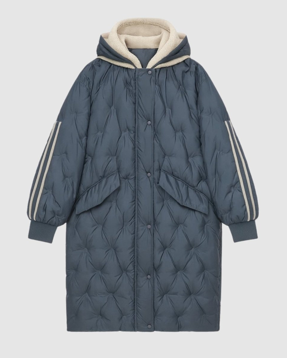 Product shot of the Meridian long quilted down parka in slate dark blue, laid flat to show front details and pockets.
