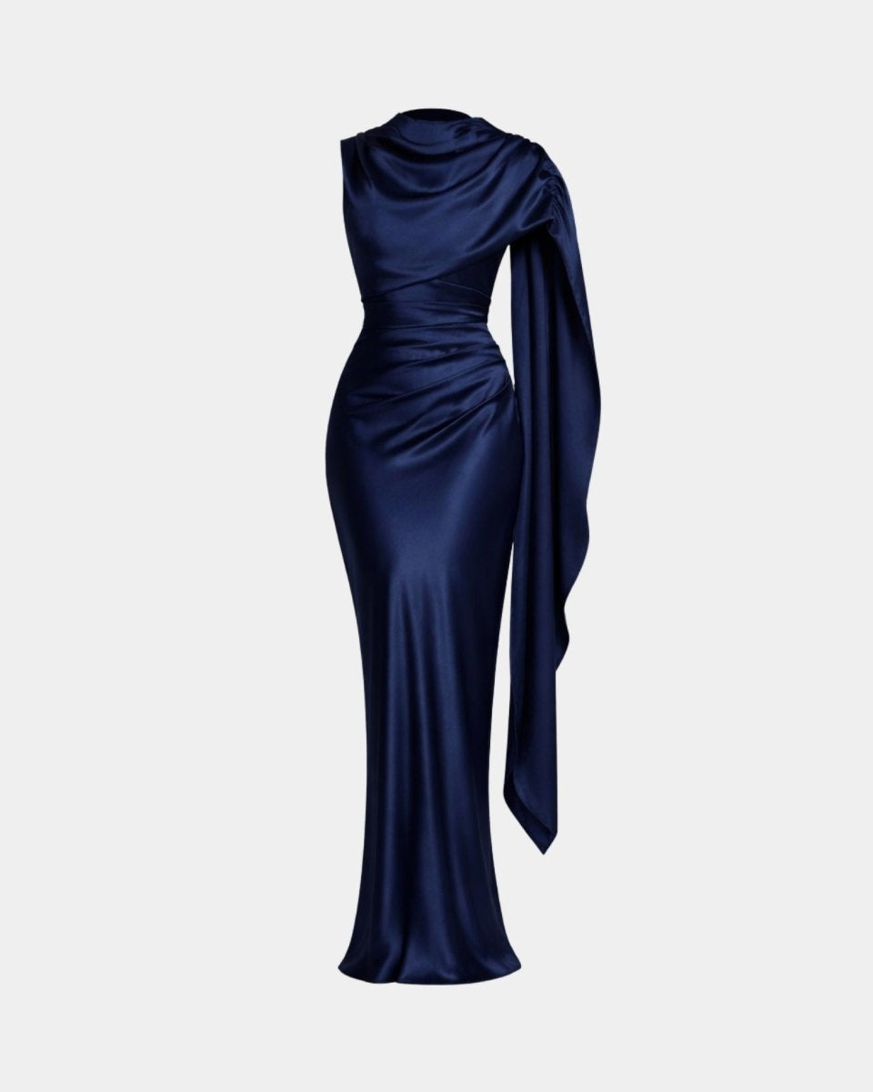 Studio ghost mannequin front view of the navy blue asymmetrical draped cape dress.