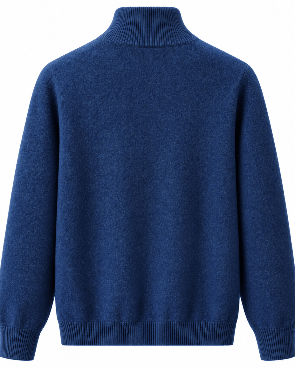 A royal blue knit turtleneck sweater shown from the back, featuring ribbed collar, cuffs, and hem, on a solid white background.