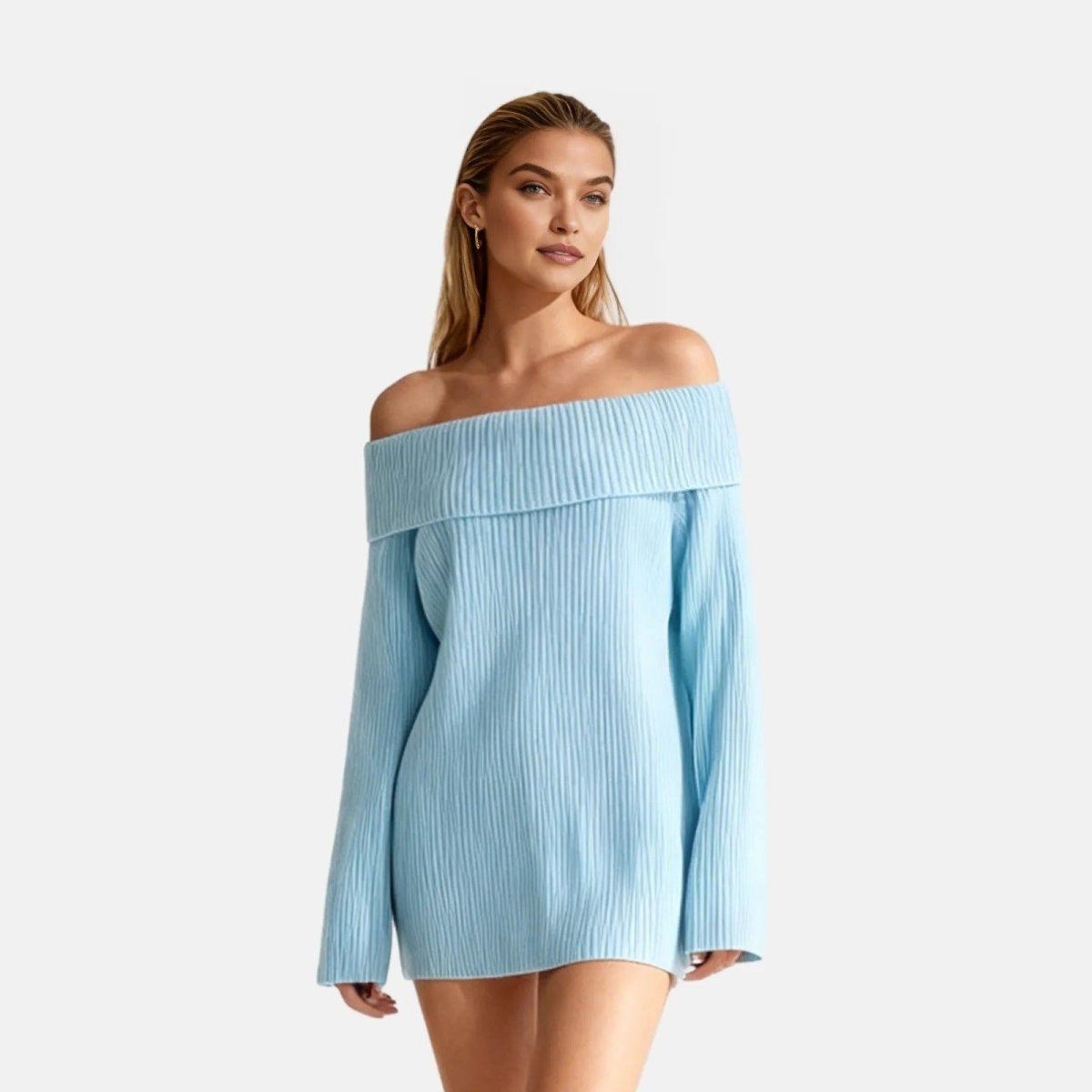 Woman wearing a light blue off-shoulder dress on a white background