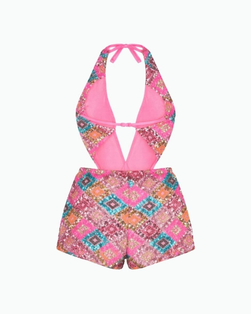 Inside back view of pink sequin playsuit showing soft pink stretch lining, halter strings, and secure back clasp closure.