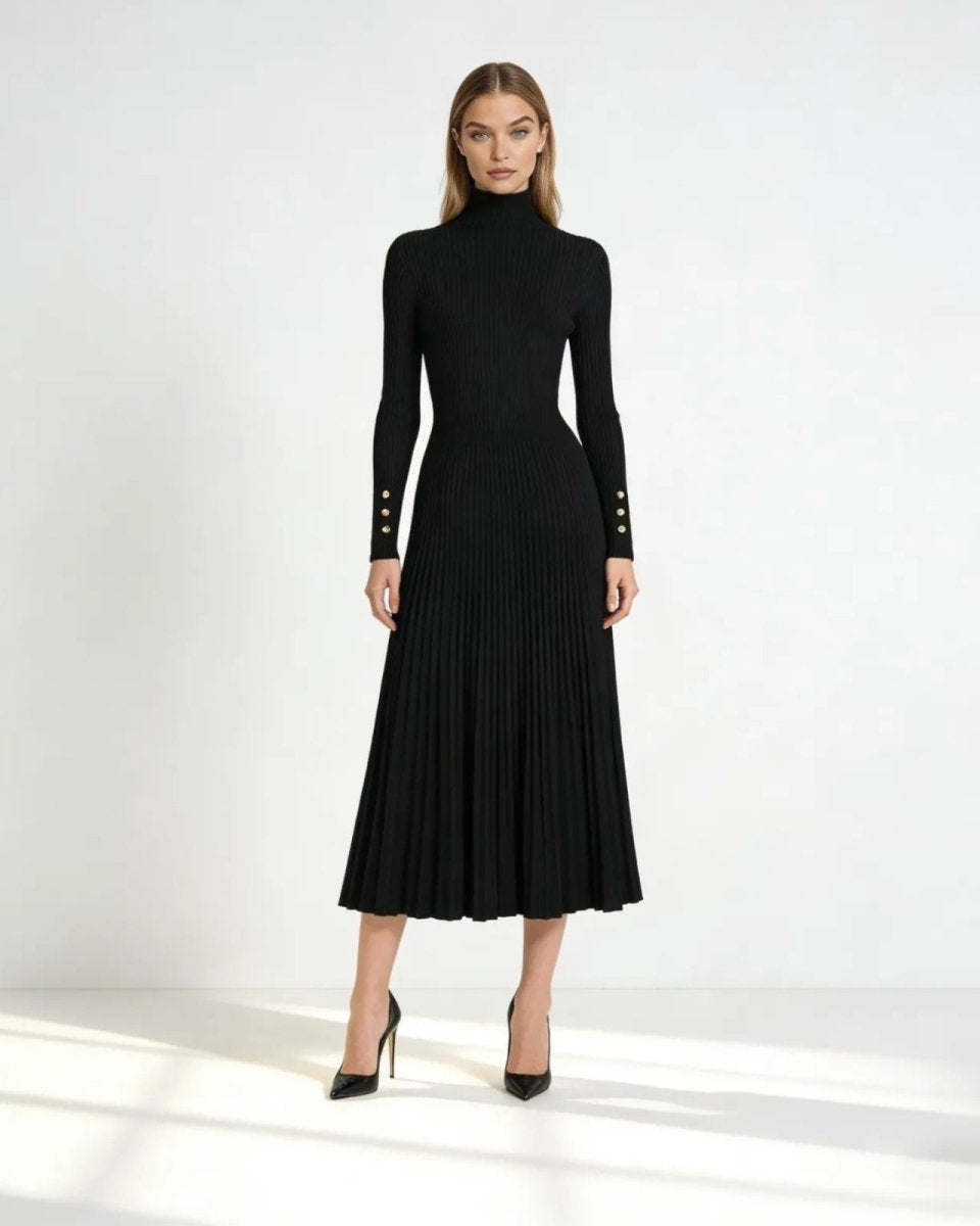 Model wearing the black pleated knit turtleneck midi dress, front view, showcasing the ribbed bodice and A-line skirt.