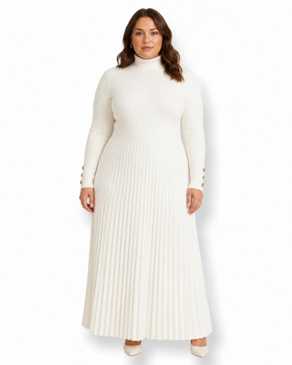 A woman modeling a long-sleeve, ribbed knit maxi dress in off-white. The dress features a mock neck, fitted bodice, and a pleated skirt.