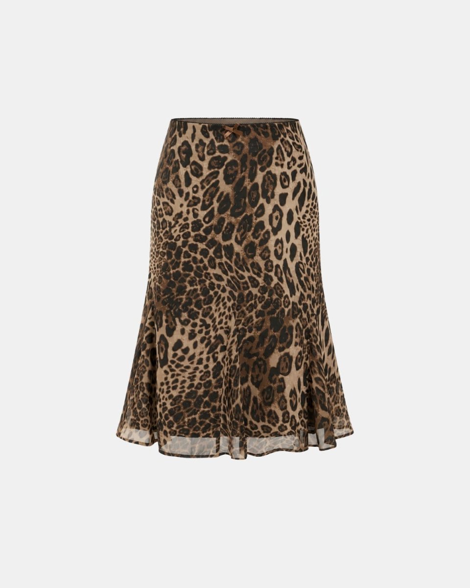 A leopard print skirt in brown and beige tones, featuring a flared silhouette and a sheer ruffled hem, shown against a plain light gray background.