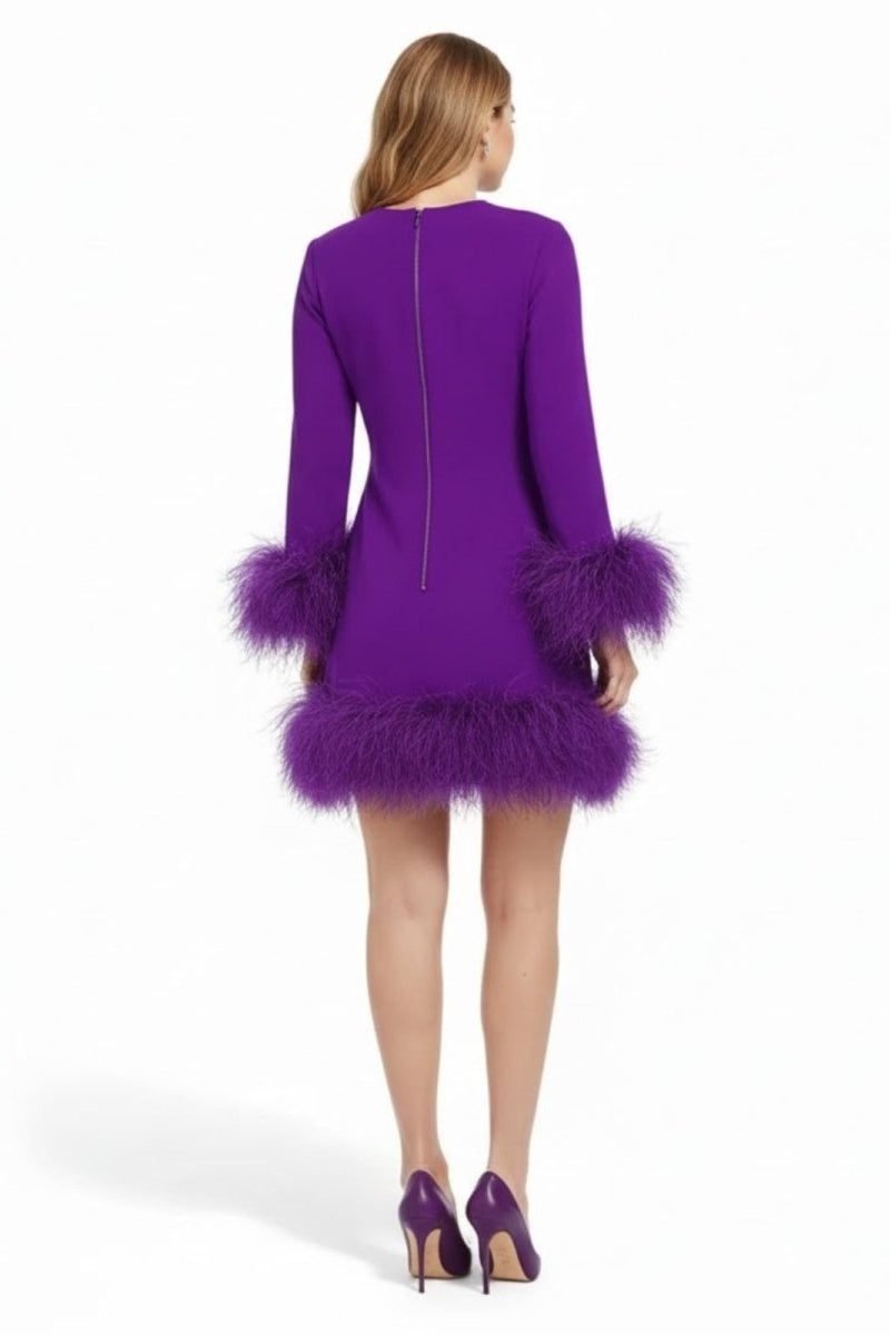 Back view of the Kouvr Fashion Arica purple mini dress, showing the long sleeves, feather cuffs, and concealed back zipper.