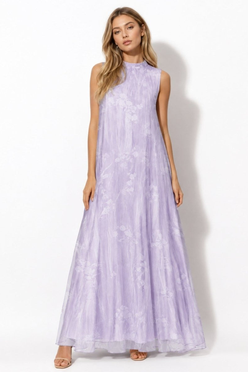 Woman wearing a luxury purple floral high neck sleeveless maxi dress by Kouvr