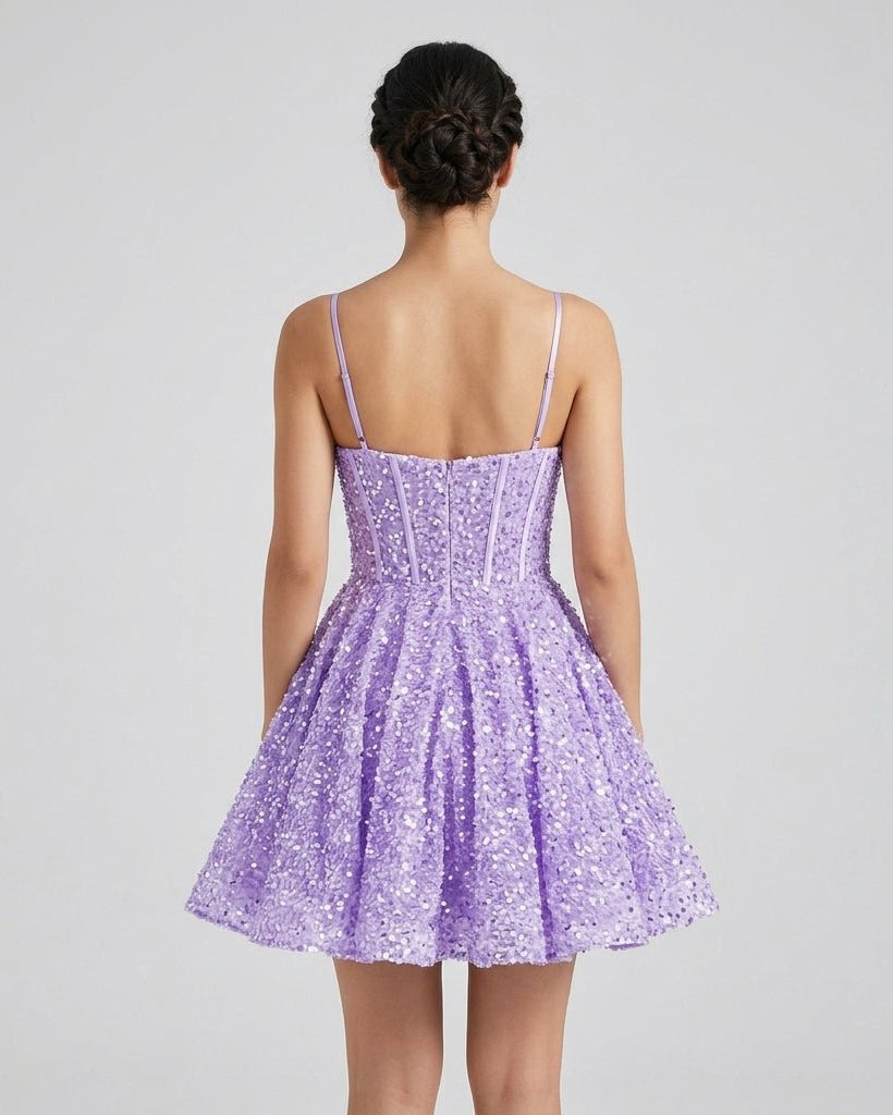 Back view of the lavender sequin party dress showing adjustable spaghetti straps and a concealed rear zipper closure.