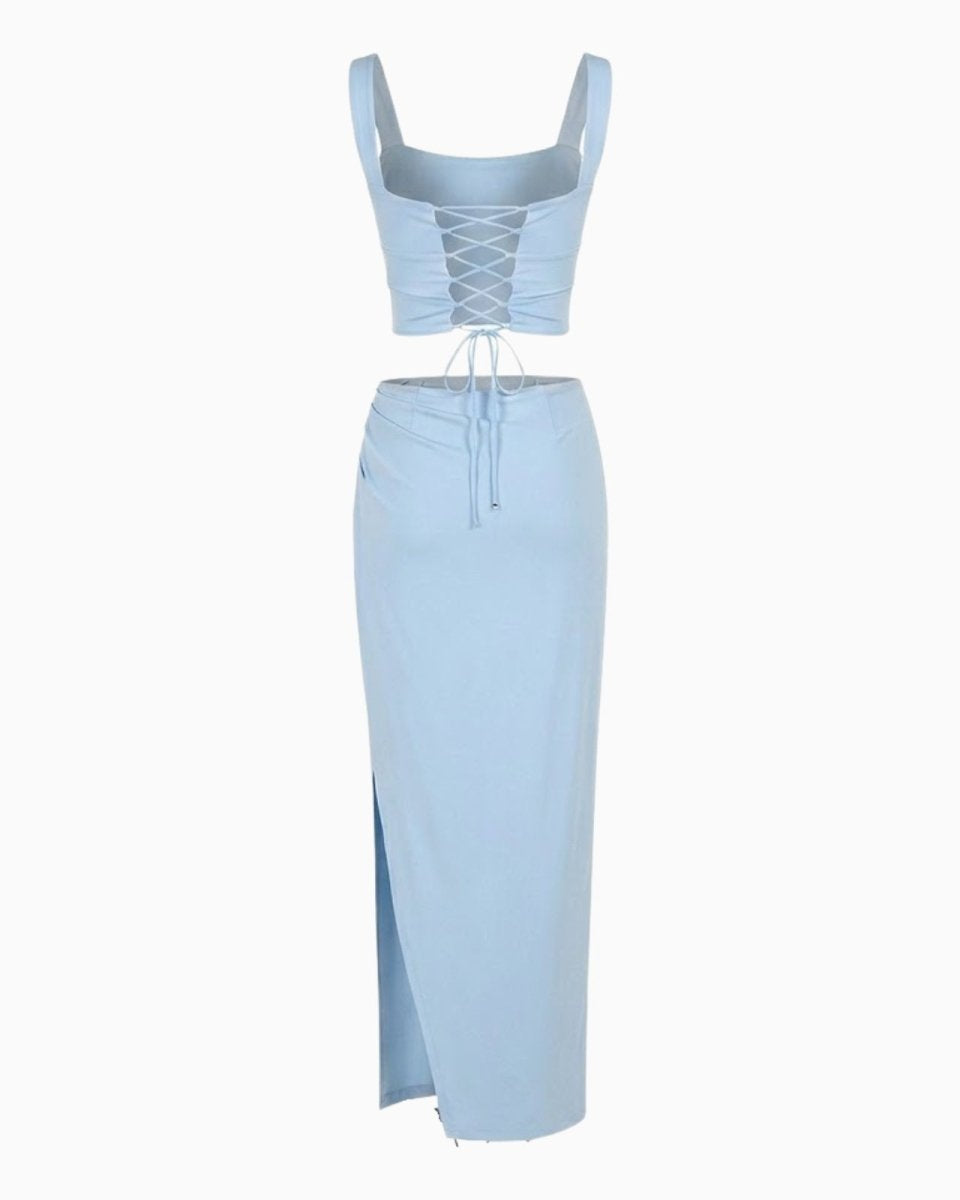 Flat lay of the light blue matching set from the back, displaying the lace-up corset detail and skirt construction.