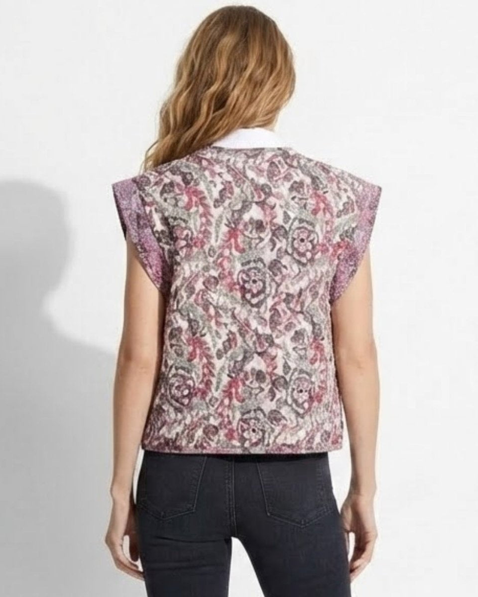 Back of the Rose vest on a model, highlighting the detailed floral and paisley print and tailored fit across the shoulders.