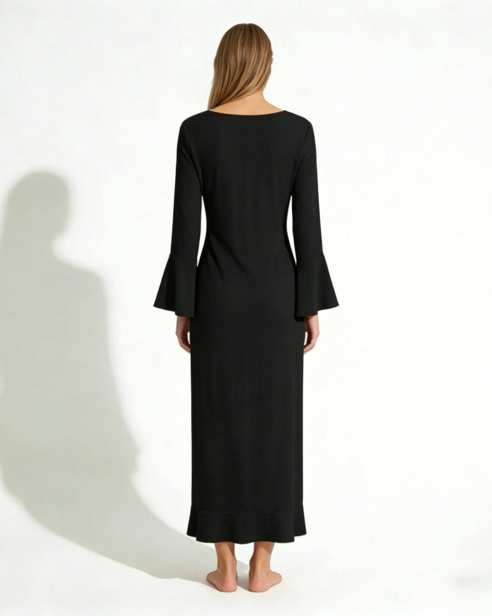 Back view of the Roseta black maxi robe, showing the clean neckline and long bell sleeves.