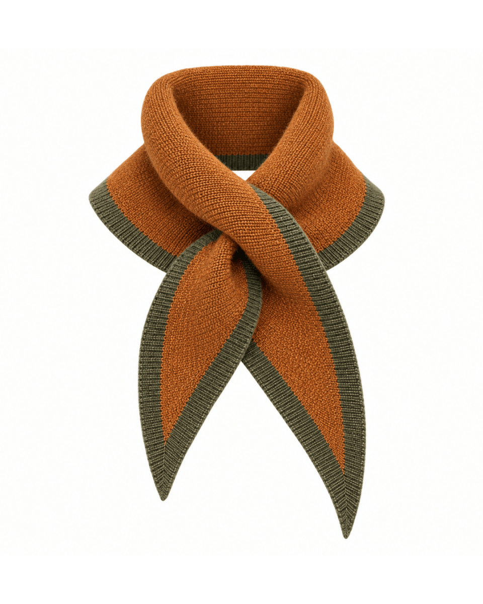 Rust orange knit scarf with an olive green contrasting border tied in a front knot, isolated on a white background.