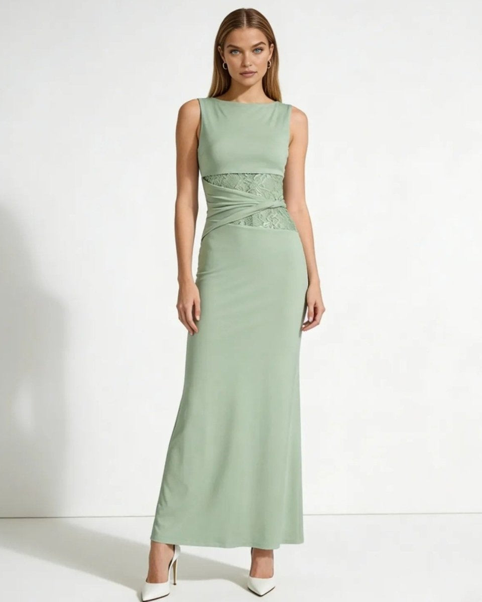 Model wearing the sage green formal maxi dress with lace cutout waist detail, front view.