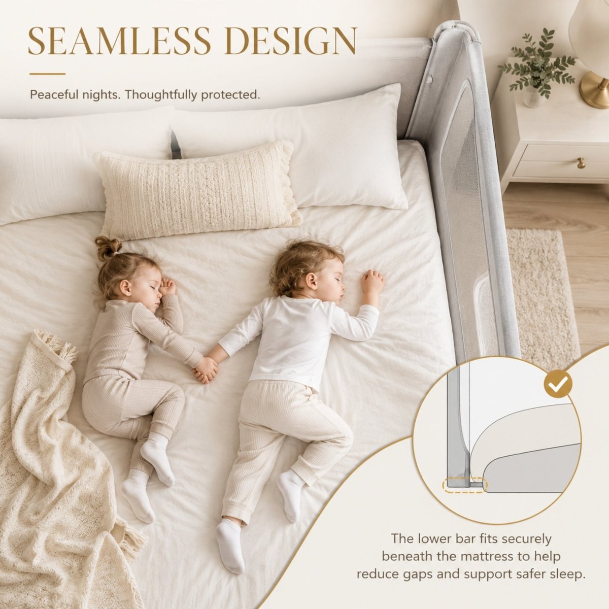 Top-down view of two toddlers sleeping peacefully next to a seamless grey Kouvr bed rail guard, with an inset diagram showing the lower bar fitting securely beneath the mattress to eliminate dangerous gaps.
