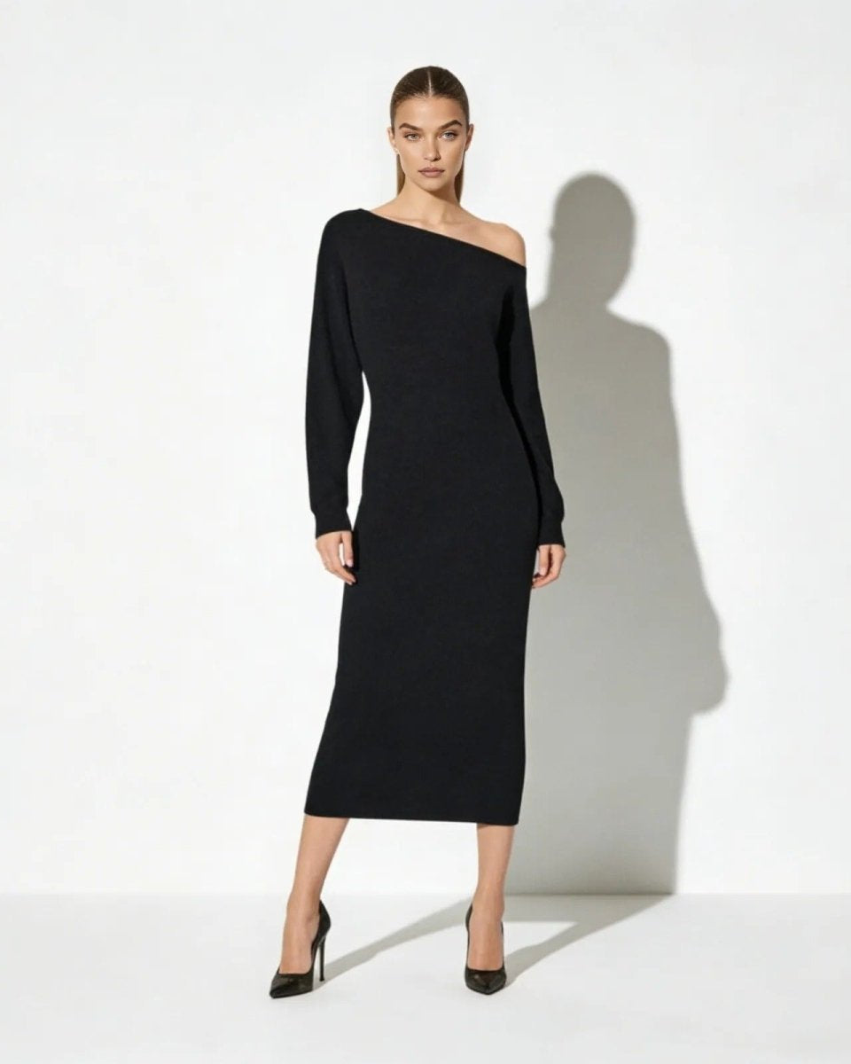 Model wearing the Selena one-shoulder black knit midi dress with long sleeves, front view.