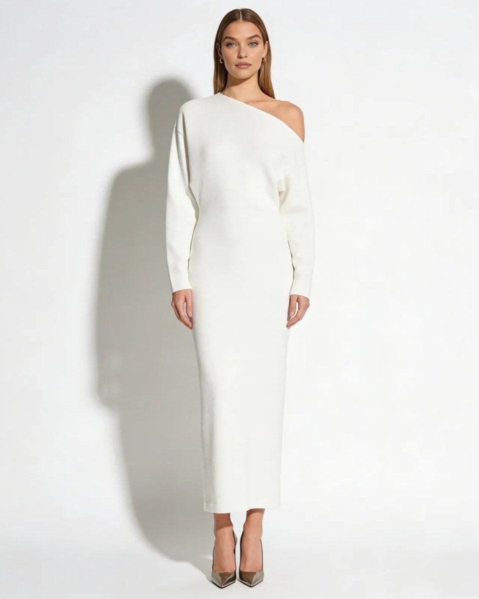 Model wearing the Selena one-shoulder white knit maxi dress, front view against a white background.