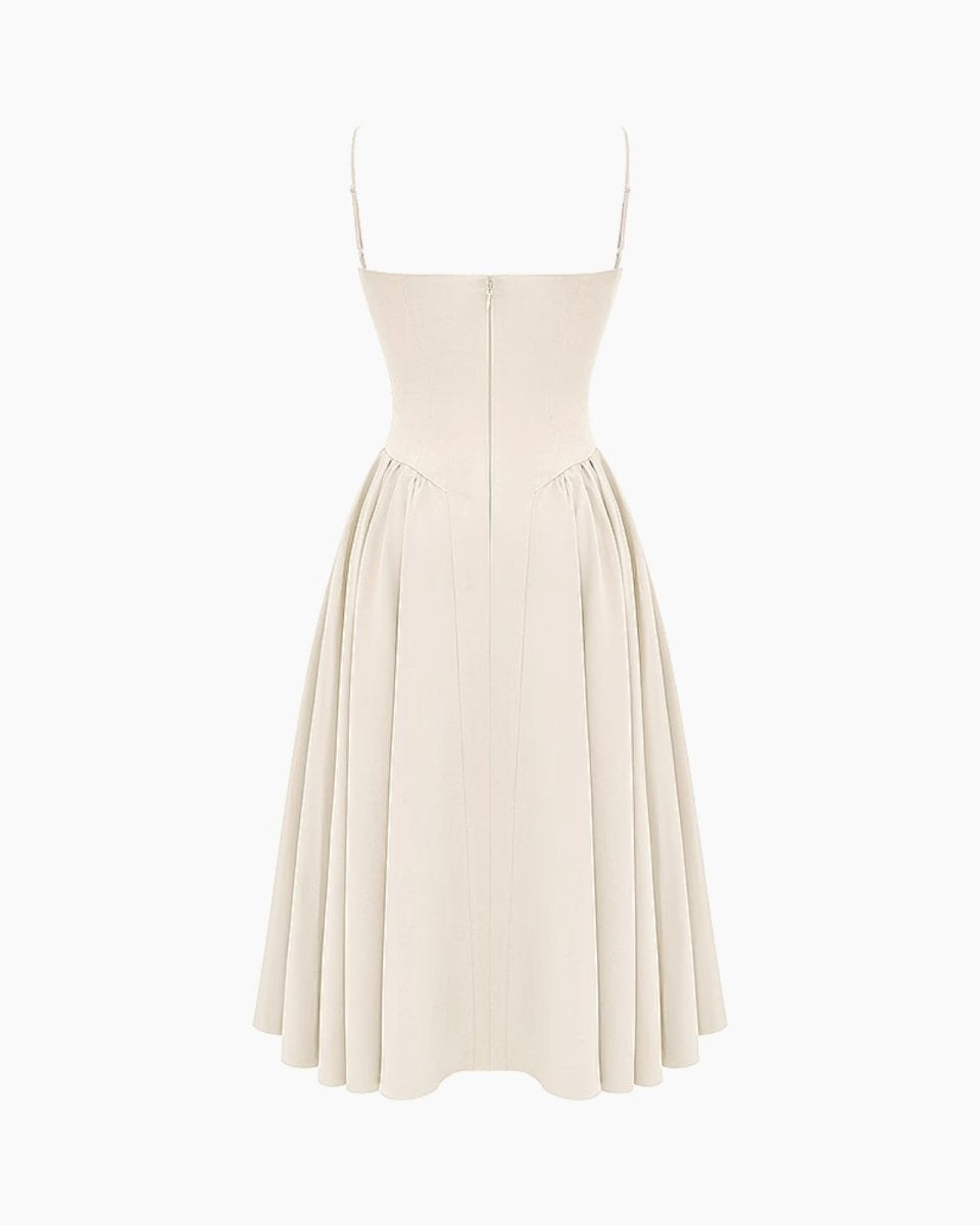 Product shot of the back of the ecru bustier midi dress, showing seam details and zipper.