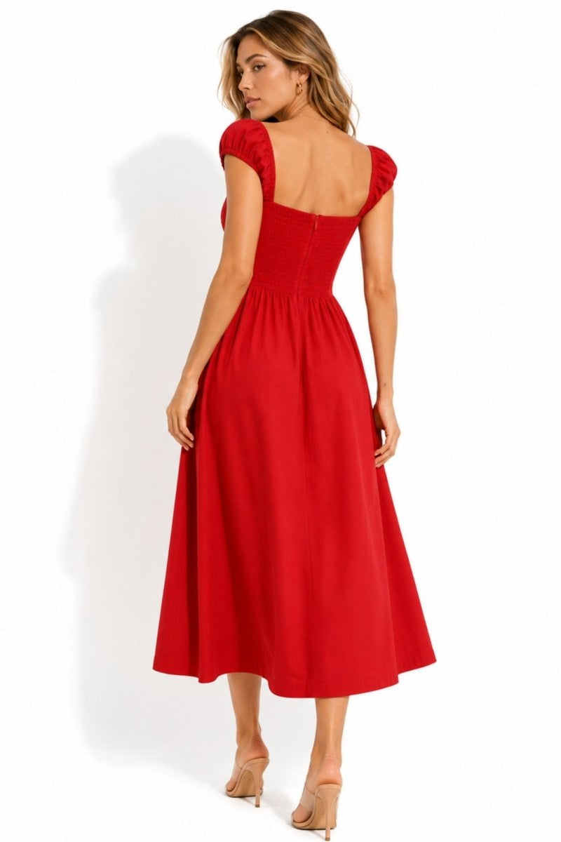 Back view of red corset summer dress showing tailored waistline and smocked back design