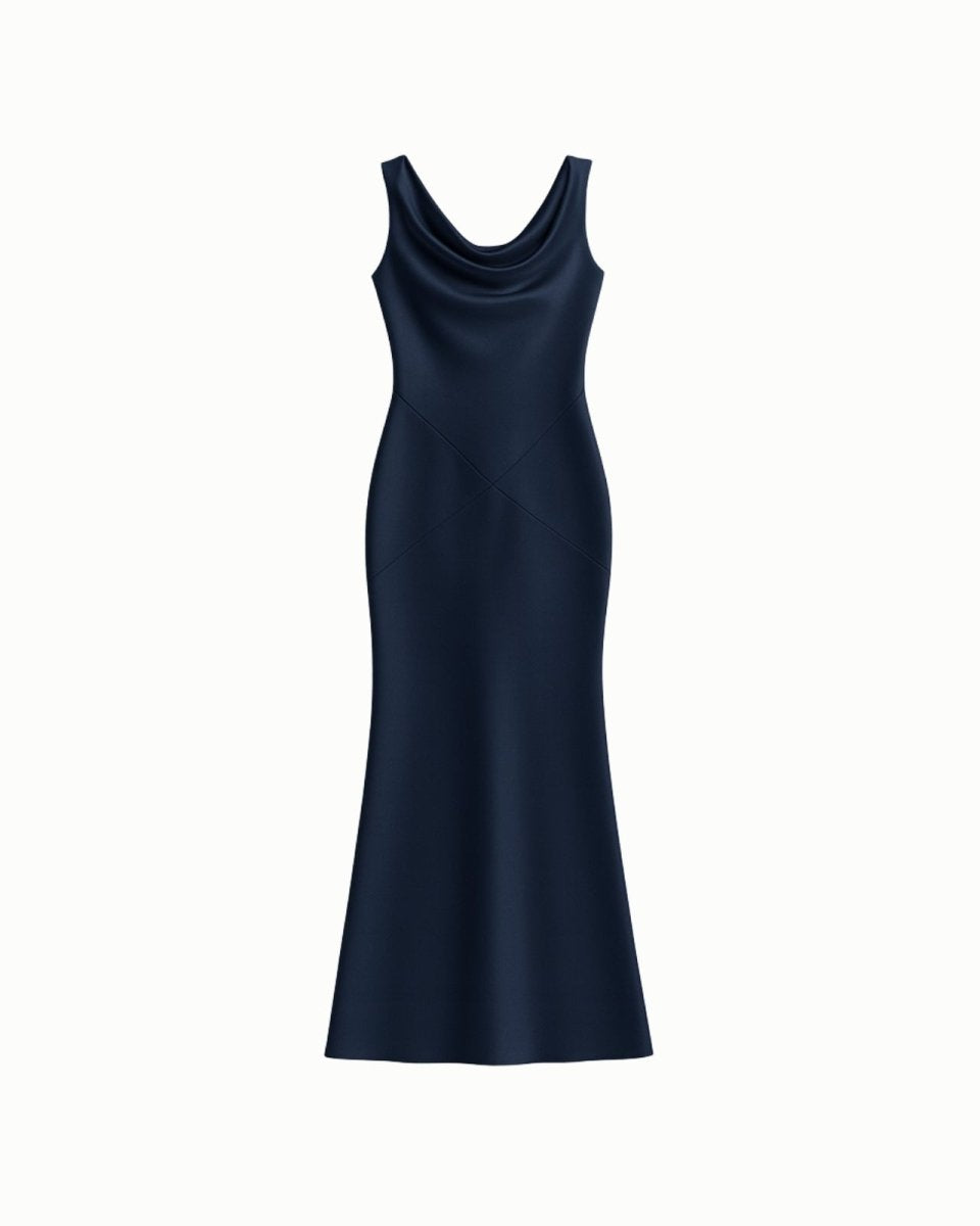 Flat lay product shot of the navy satin Vickie Gown, detailing the cowl neck and intricate seam work.