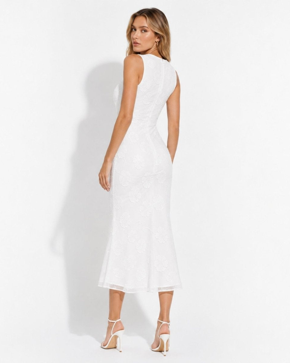 Back view of white flocked chiffon long cocktail dress showing seamless zipper