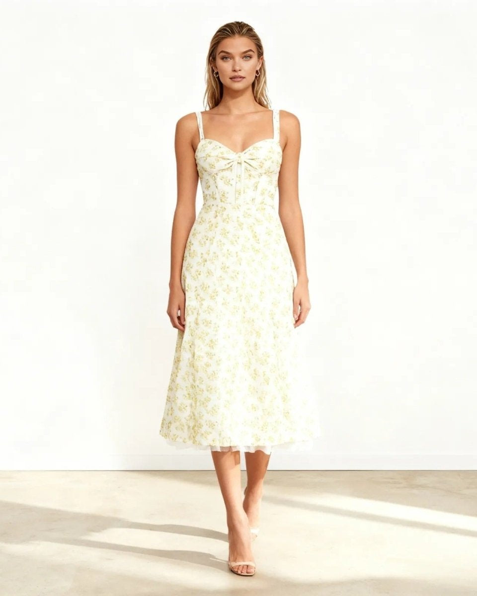 Model wearing the white floral midi dress with sweetheart neckline, shown from the front against a white background.