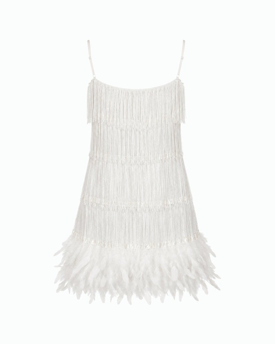 White fringed spaghetti-strap mini dress with feathered hem, shown on a plain white background.