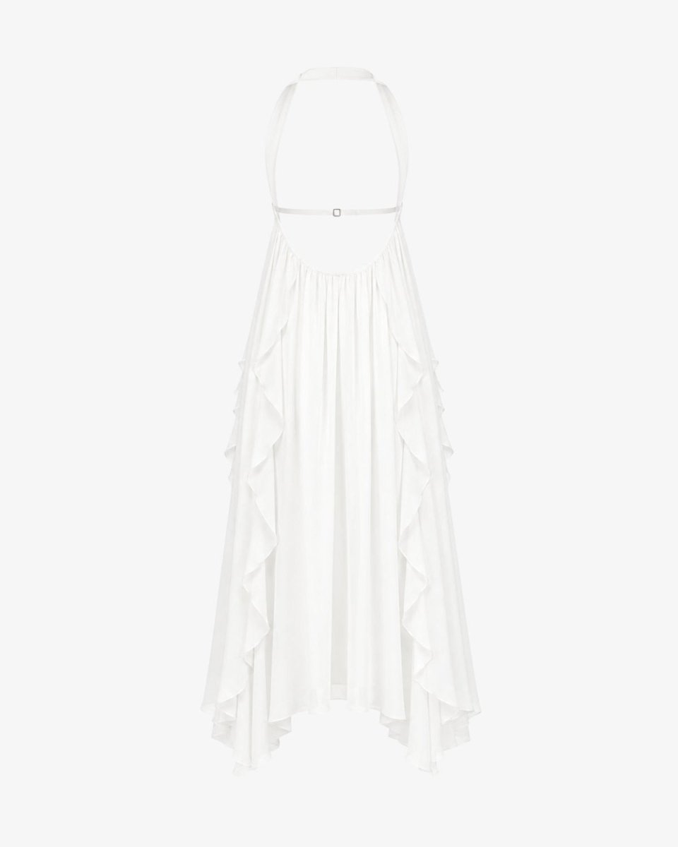 A white halter-neck dress with a ruffled, tiered skirt and an asymmetrical hemline, shown against a plain white background.