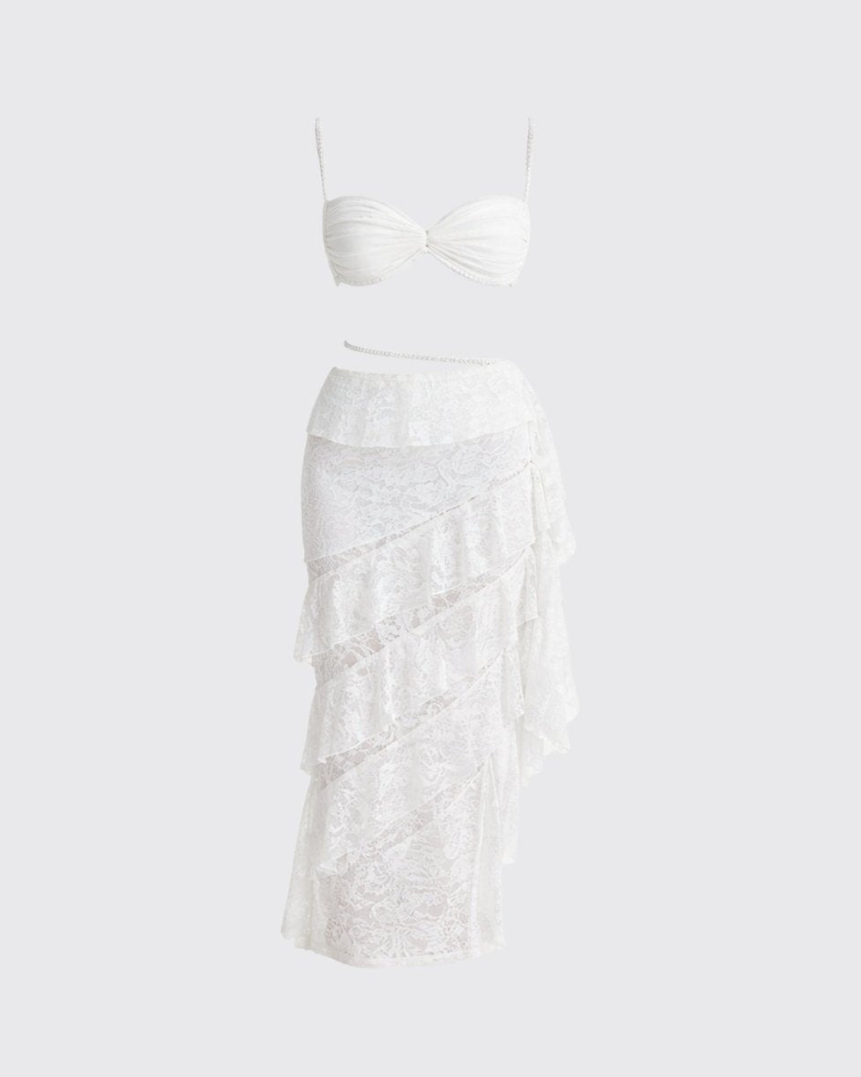 Front flat lay product shot of the white sweetheart bralette and tiered lace maxi skirt co-ord set.