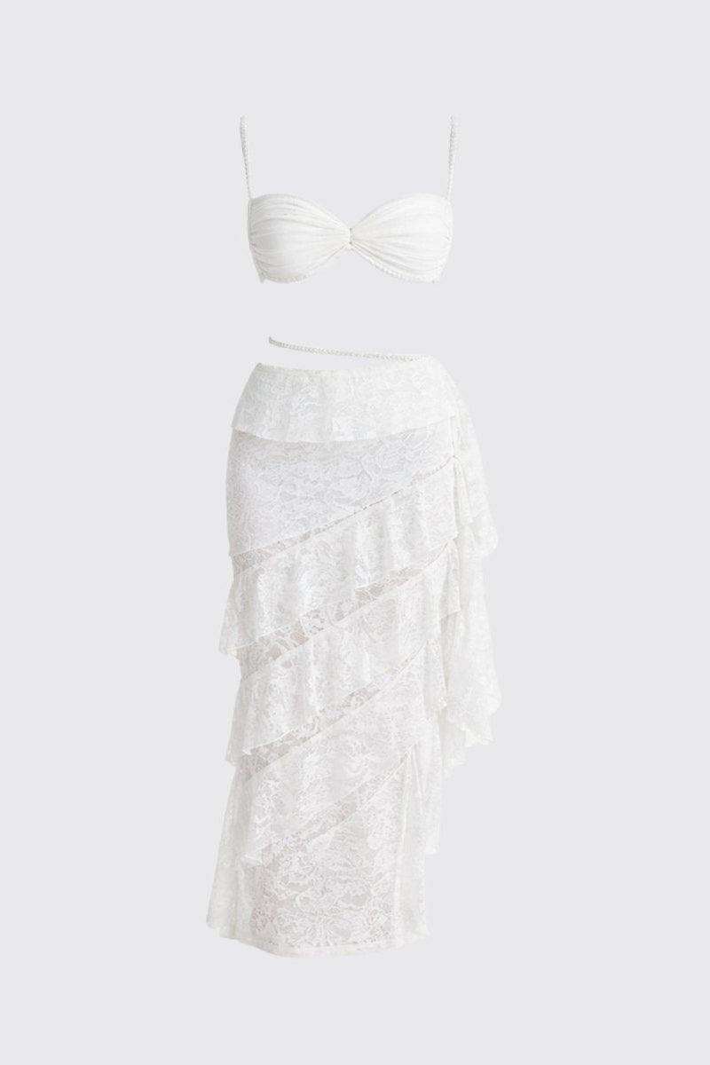 White lace dress on a light gray background