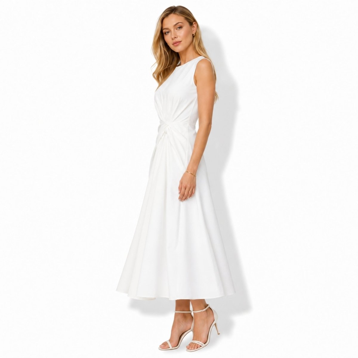 Beautiful front drape detail of elegant white A-line dress showing high quality structured fabric and expert twist knot waist craftsmanship.