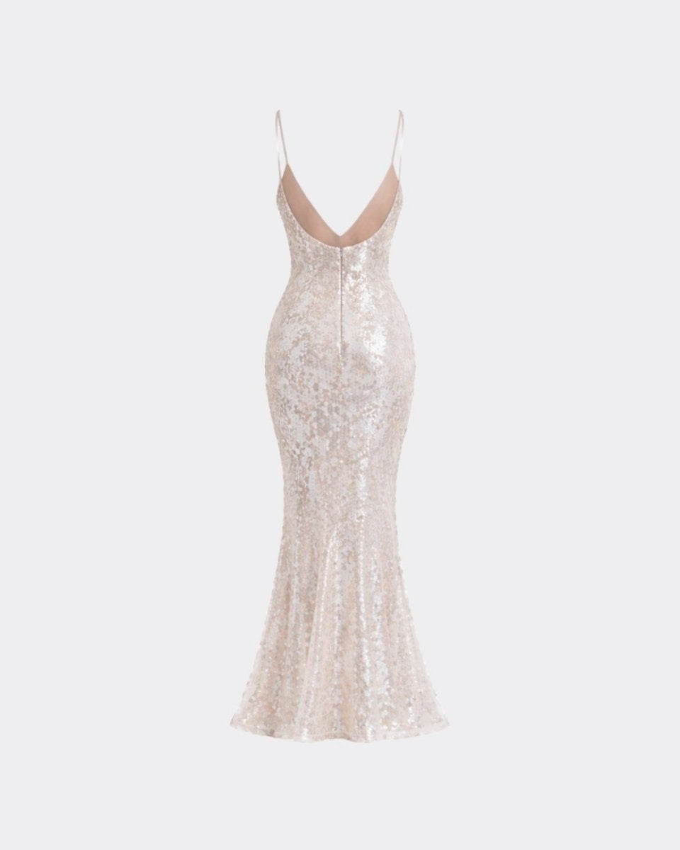 Ghost mannequin back view of the shimmering white long formal dress, showing the low back cut, invisible zipper, and overall glamorous shape.