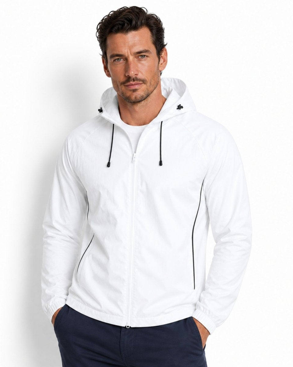 Man wearing white zip up hooded athletic windbreaker jacket