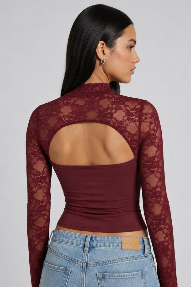 Back view of Kouvr wine red sheer lace long sleeve top showing large open back cut-out on model