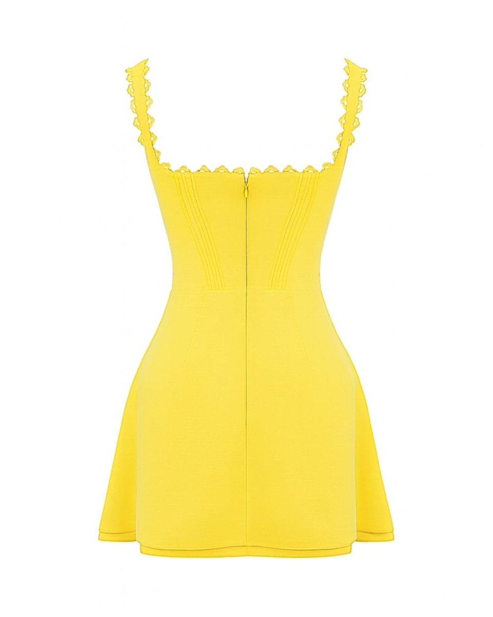 Flat lay showing the back and concealed zipper detail of the yellow structured mini dress.