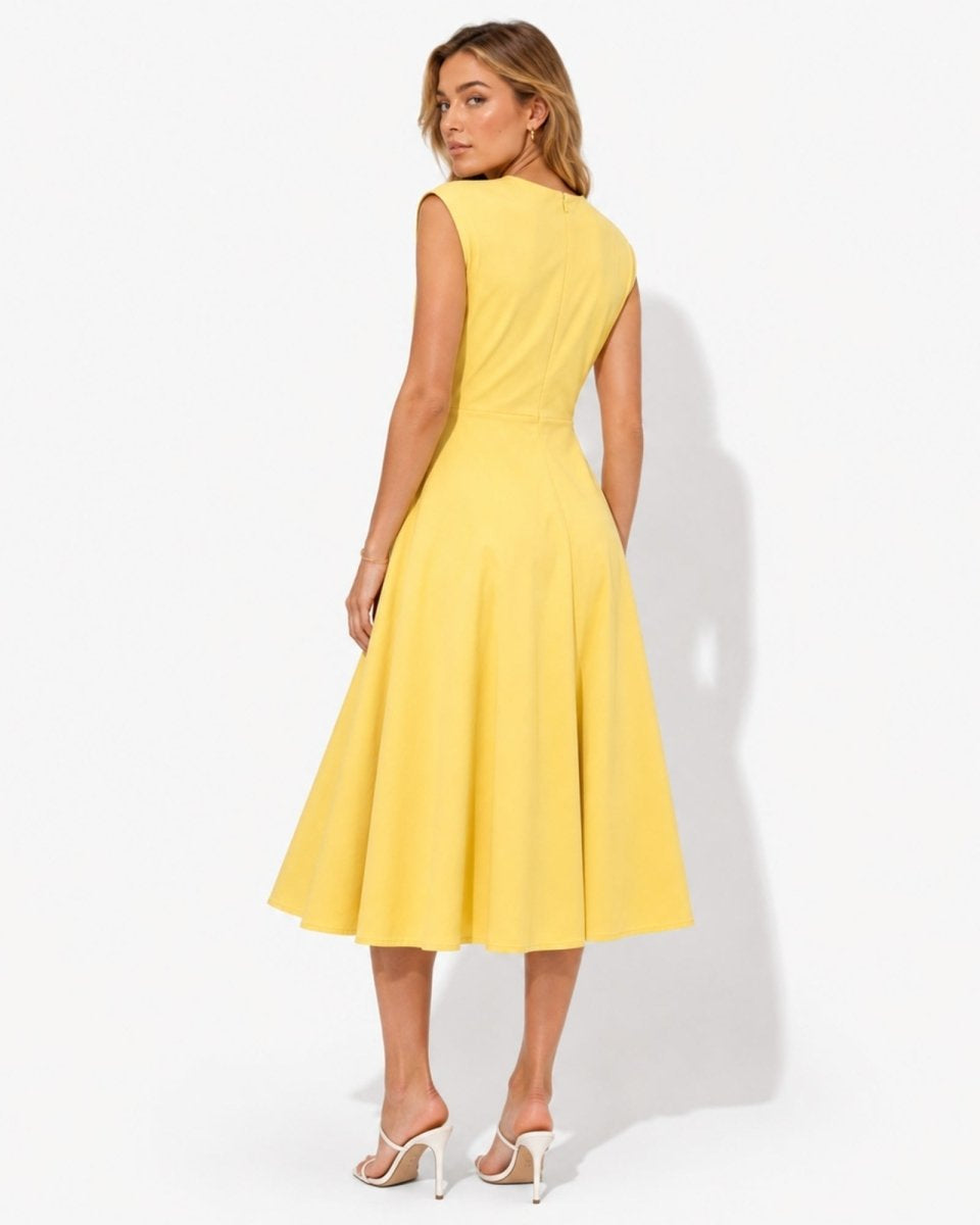 Back view of yellow sleeveless crewneck midi dress showing a seamless concealed zipper and elegant sweeping hemline.