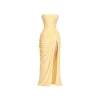 Front flat lay studio view of pale yellow strapless gown with draped waist and thigh slit detail.
