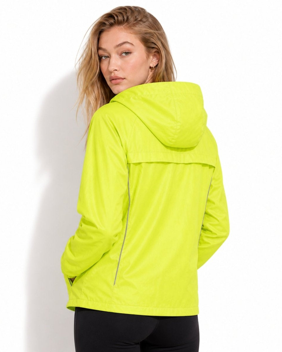 Back view of female model in yellow windbreaker showing breathable horizontal back yoke ventilation panel