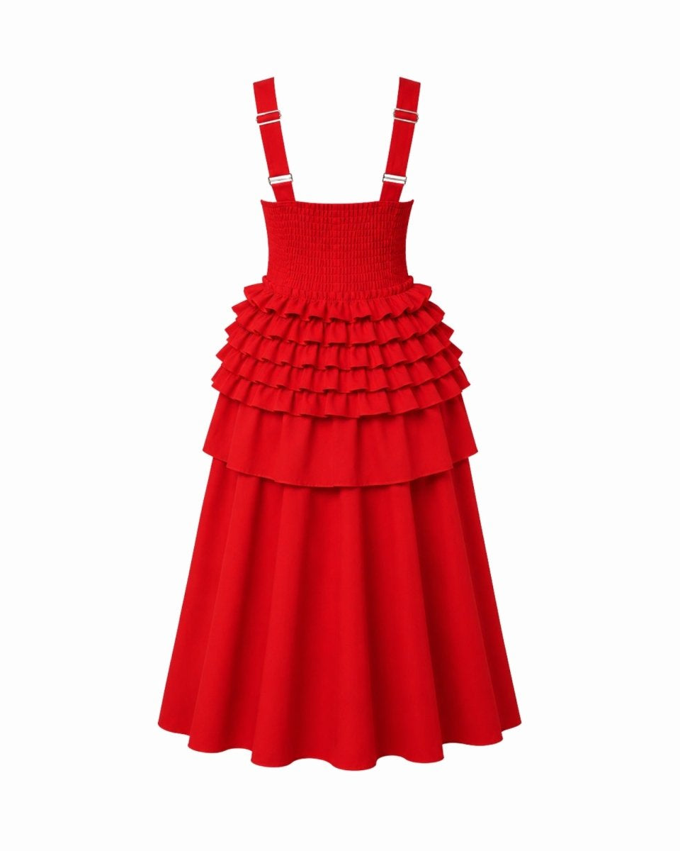 A bright red sleeveless dress with wide shoulder straps, a smocked bodice, and three tiered ruffle layers on the skirt, shown against a plain white background.