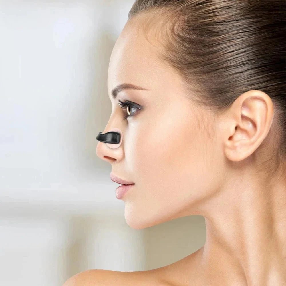 Woman with a black magnetic nose strip on a blurred background