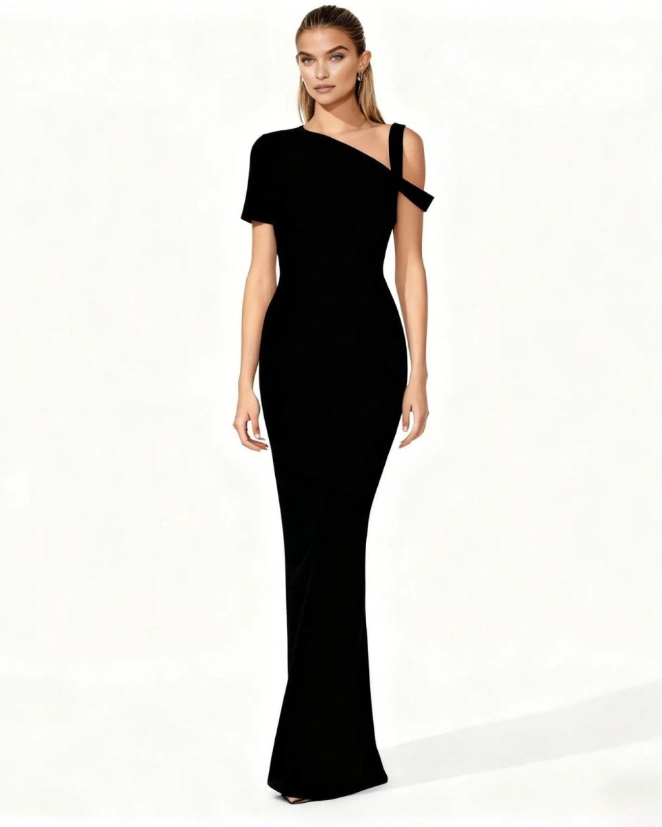 Black one-shoulder dress worn by a model on a white background