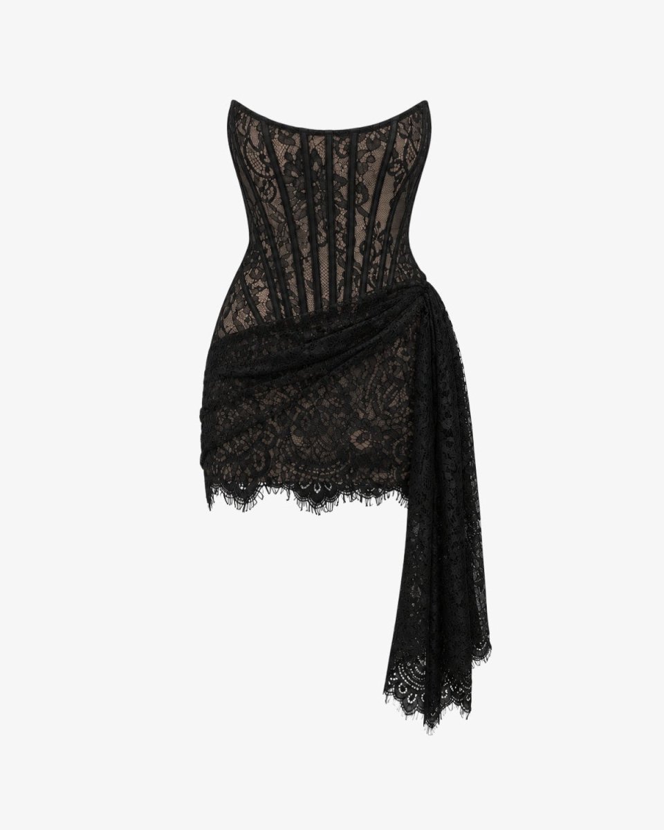 A black lace corset-style top with a sheer corseted bodice and a draped lace skirt overlay, shown on a plain light gray background.