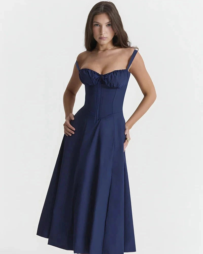 Woman wearing a blue strapless dress on a white background