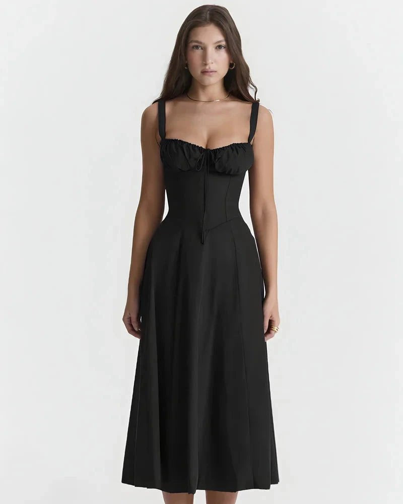 Woman wearing a black dress on a white background